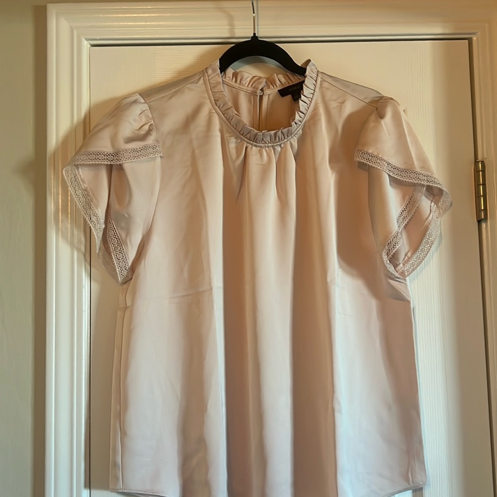 Beautiful peach colored blouse runs big size large